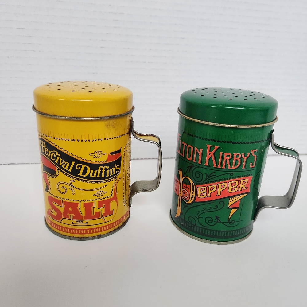 Vintage shakers advertising Percival Duffin's salt Elton Kirby pepper